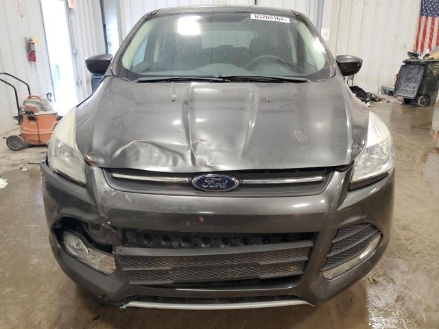 Photo 5 from auction – 2016 FORD ESCAPE with VIN 1FMCU0GX4GUB80294
