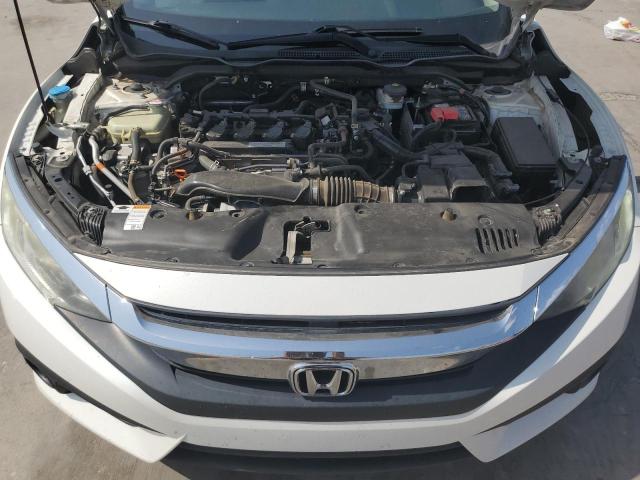 Photo 11 from auction – 2016 HONDA CIVIC EX with VIN 19XFC1F48GE045125