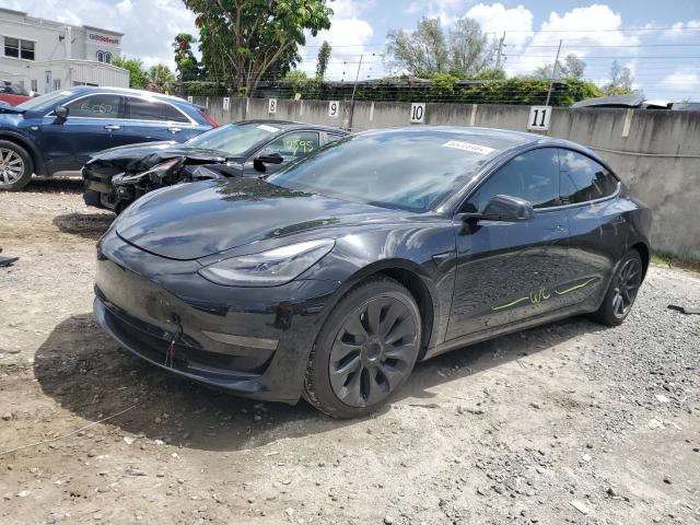 TESLA MODEL 3 2021 with VIN 5YJ3E1EB3MF048999 - Photo from auction