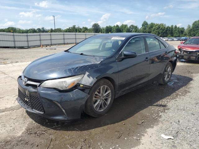 TOYOTA CAMRY LE 2017 with VIN 4T1BF1FKXHU659046 - Photo from auction