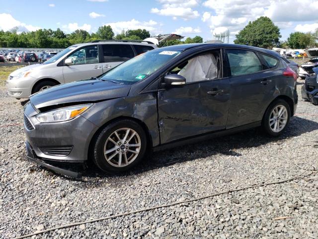 FORD FOCUS SE 2018 with VIN 1FADP3K28JL291009 - Photo from auction
