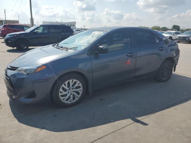 TOYOTA COROLLA L 2019 with VIN 5YFBURHE9KP863745 - Photo from auction