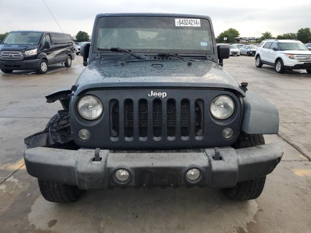 Photo 5 from auction – 2016 JEEP WRANGLER U with VIN 1C4BJWDG8GL323771