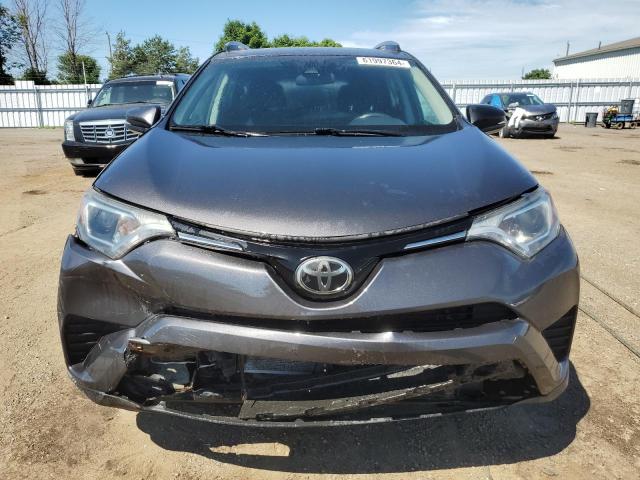 Photo 5 from auction – 2017 TOYOTA RAV4 LE with VIN 2T3ZFREV0HW324197