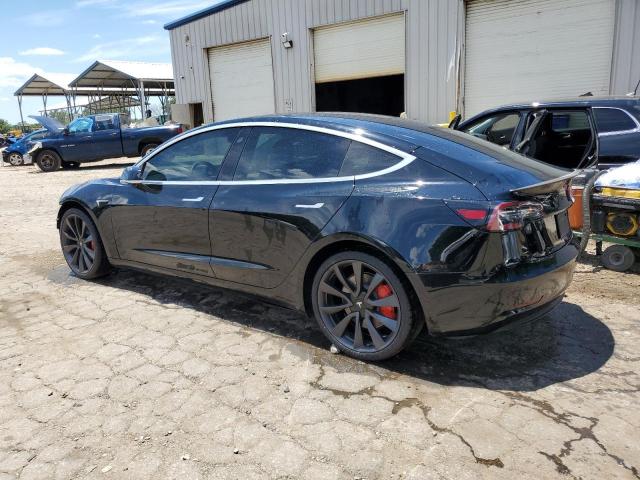 Photo 2 from auction – 2020 TESLA MODEL 3 with VIN 5YJ3E1EC2LF713172