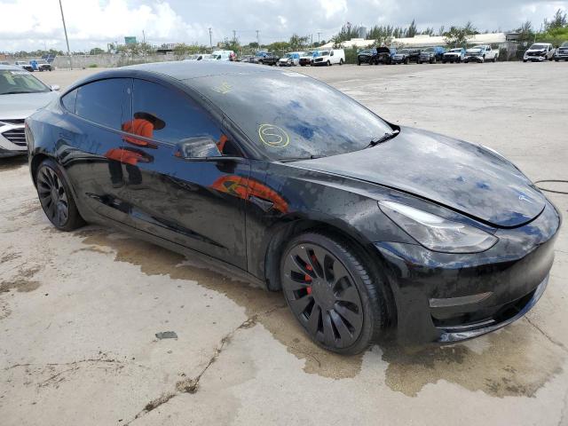 Photo 4 from auction – 2022 TESLA MODEL 3 with VIN 5YJ3E1EC2NF199312