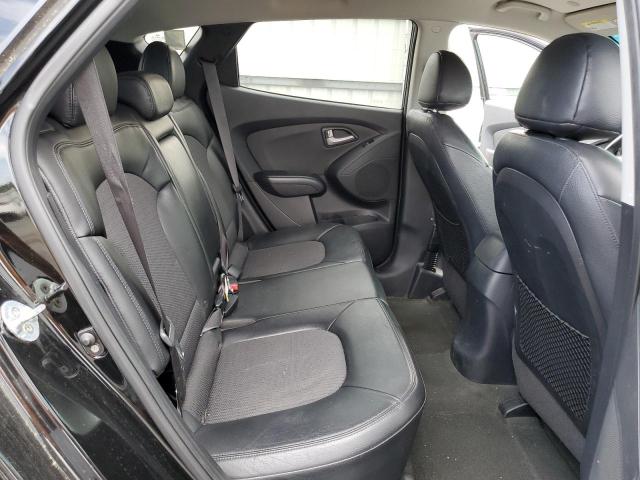 Photo 11 from auction – 2012 HYUNDAI TUCSON with VIN KM8JUCAC3CU417141