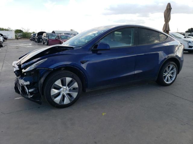 TESLA MODEL Y 2023 with VIN 7SAYGDEE6PA166383 - Photo from auction
