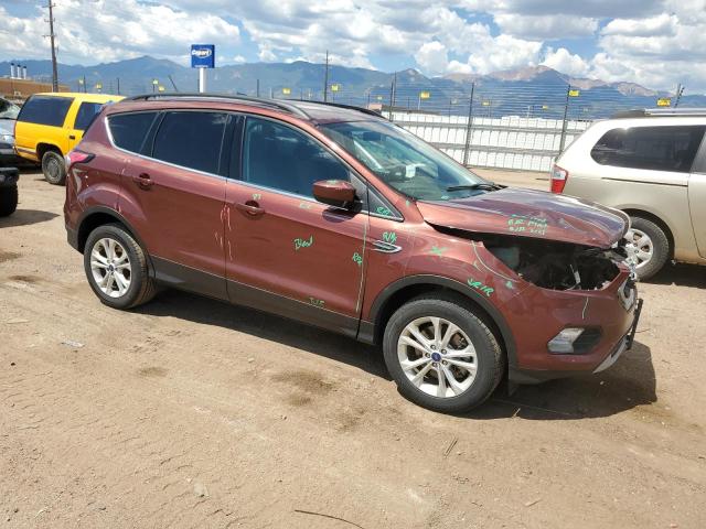 Photo 4 from auction – 2018 FORD ESCAPE SE with VIN 1FMCU9GD9JUB26488