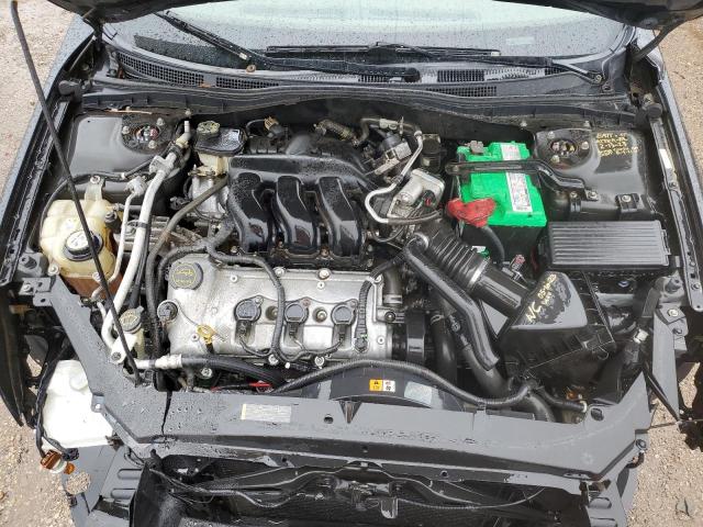 Photo 11 from auction – 2006 MERCURY MILAN with VIN 3MEFM07176R662419