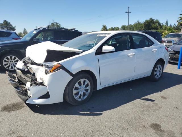 TOYOTA COROLLA L 2017 with VIN 5YFBURHE4HP696364 - Photo from auction