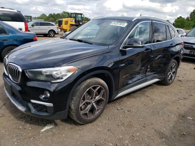 BMW X1 XDRIVE2 2018 with VIN WBXHT3C39J5K25932 - Photo from auction