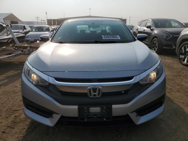Photo 5 from auction – 2017 HONDA CIVIC EX with VIN 19XFC2F75HE018482