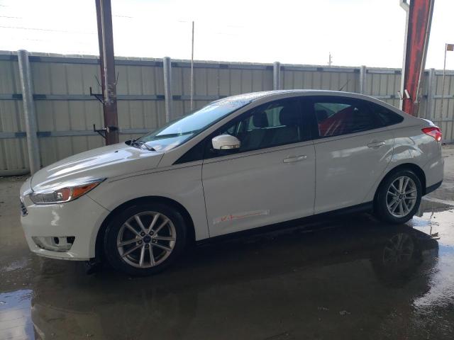 FORD FOCUS SE 2016 with VIN 1FADP3F24GL376917 - Photo from auction