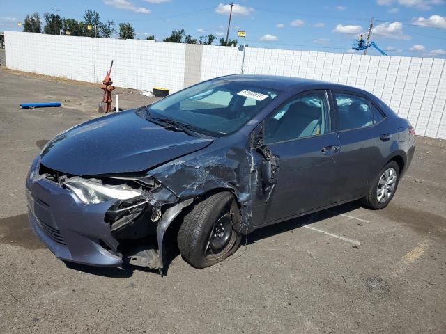 TOYOTA COROLLA L 2014 with VIN 5YFBURHE7EP099415 - Photo from auction