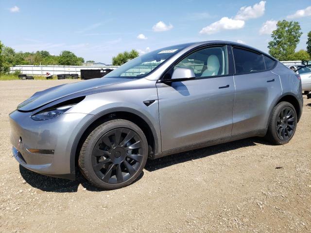 TESLA MODEL Y 2024 with VIN 7SAYGDEE4RA288324 - Photo from auction