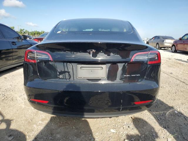 Photo 6 from auction – 2022 TESLA MODEL 3 with VIN 5YJ3E1EB7NF313599