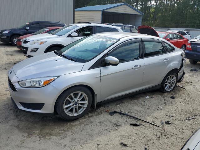 FORD FOCUS SE 2017 with VIN 1FADP3FEXHL256390 - Photo from auction