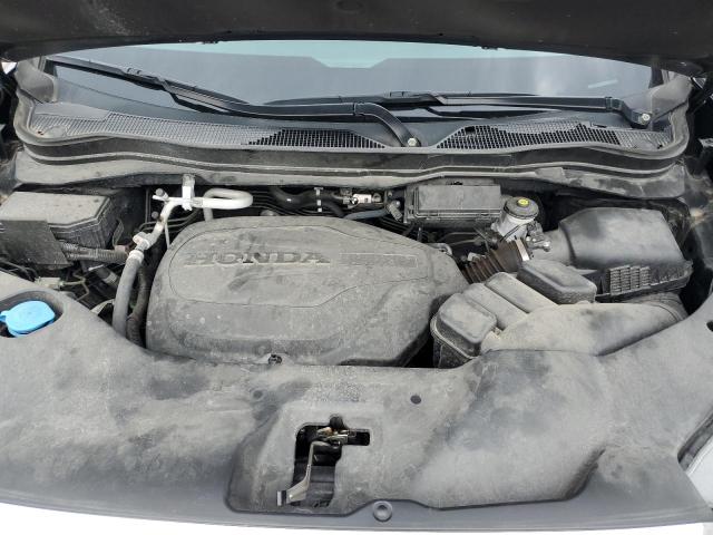 Photo 11 from auction – 2022 HONDA RIDGELINE with VIN 5FPYK3F72NB035304