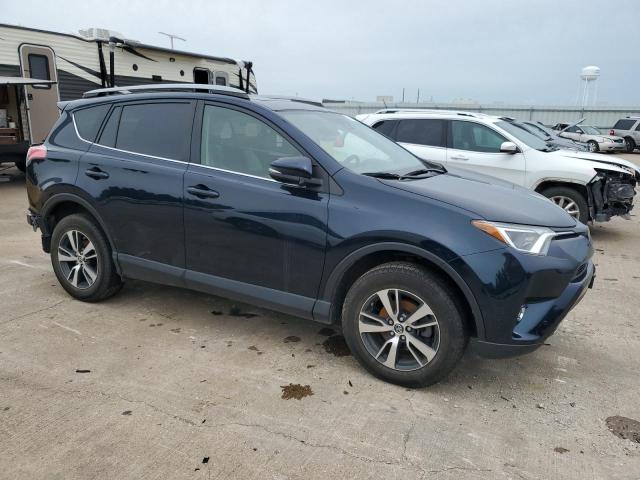 Photo 4 from auction – 2017 TOYOTA RAV4 XLE with VIN JTMRFREV7HD211876