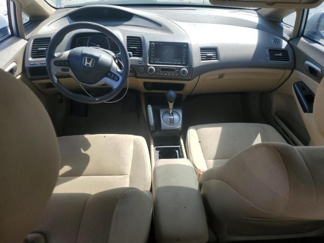 Photo 8 from auction – 2006 HONDA CIVIC HYBR with VIN JHMFA36206S023937