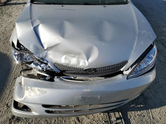 Photo 11 from auction – 2003 TOYOTA CAMRY LE with VIN JTDBE32K030151886
