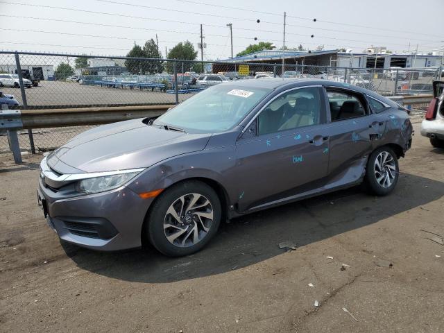 HONDA CIVIC EX 2018 with VIN 2HGFC2F74JH501697 - Photo from auction