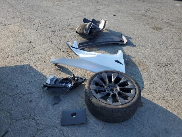 Photo 12 from auction – 2020 TESLA MODEL Y with VIN 5YJYGDEE3LF053050