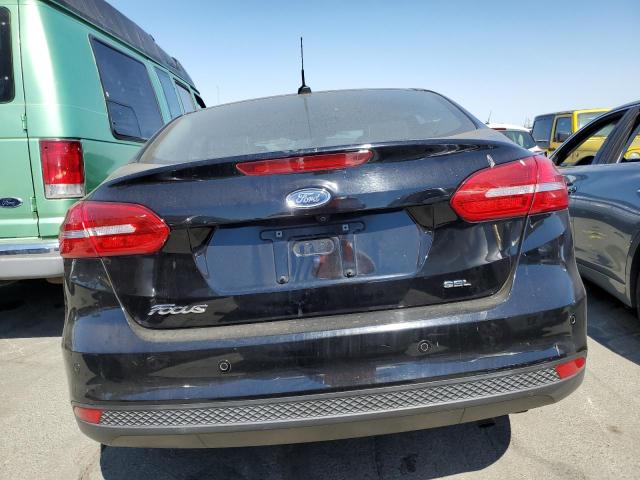 Photo 6 from auction – 2018 FORD FOCUS SEL with VIN 1FADP3H20JL238134