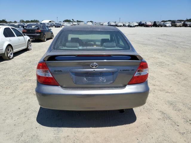 Photo 6 from auction – 2002 TOYOTA CAMRY LE with VIN JTDBE30K820051259
