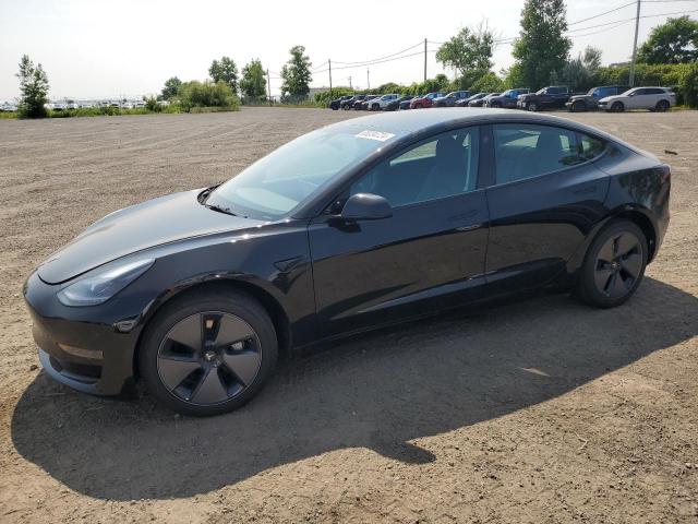 TESLA MODEL 3 2023 with VIN LRW3E1FA7PC945117 - Photo from auction