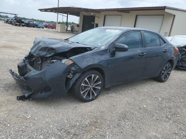TOYOTA COROLLA L 2018 with VIN 5YFBURHE7JP824814 - Photo from auction