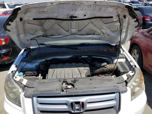 Photo 12 from auction – 2006 HONDA PILOT EX with VIN 2HKYF18726H542544