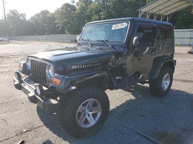 JEEP WRANGLER / 2003 with VIN 1J4FA69S13P345610 - Photo from auction