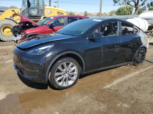 TESLA MODEL Y 2023 with VIN 7SAYGDEE7PF627643 - Photo from auction