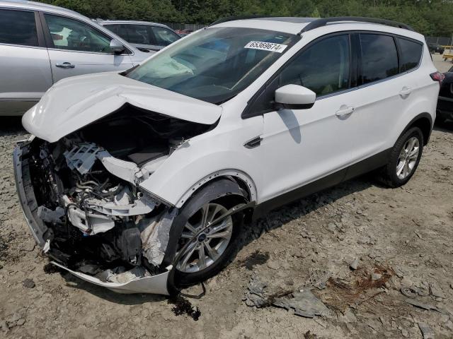 FORD ESCAPE SE 2017 with VIN 1FMCU9G91HUC70932 - Photo from auction