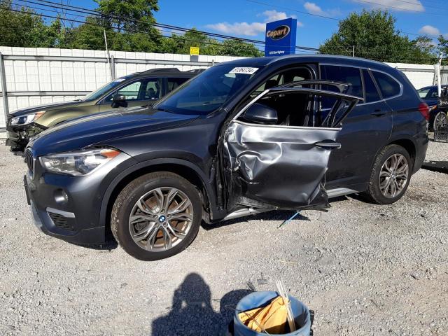 BMW X1 XDRIVE2 2017 with VIN WBXHT3C32H5F74928 - Photo from auction