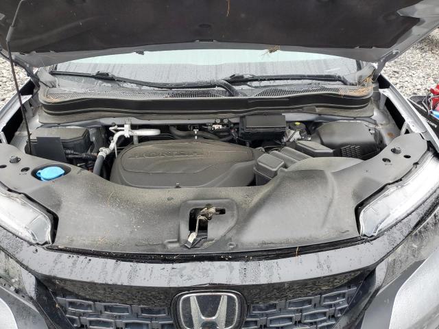 Photo 11 from auction – 2021 HONDA PASSPORT E with VIN 5FNYF8H50MB030185