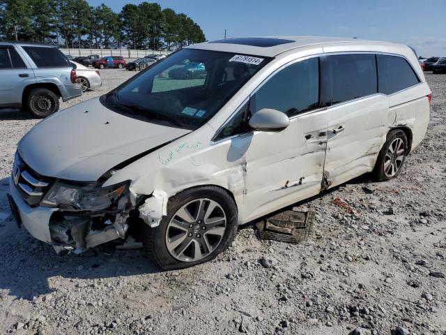 Photo 1 from auction – 2014 HONDA ODYSSEY TO with VIN 5FNRL5H90EB076034