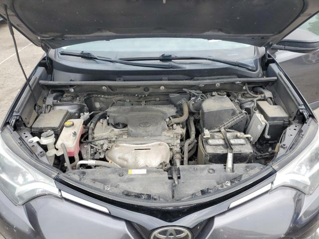 Photo 12 from auction – 2018 TOYOTA RAV4 LE with VIN 2T3BFREV4JW743970
