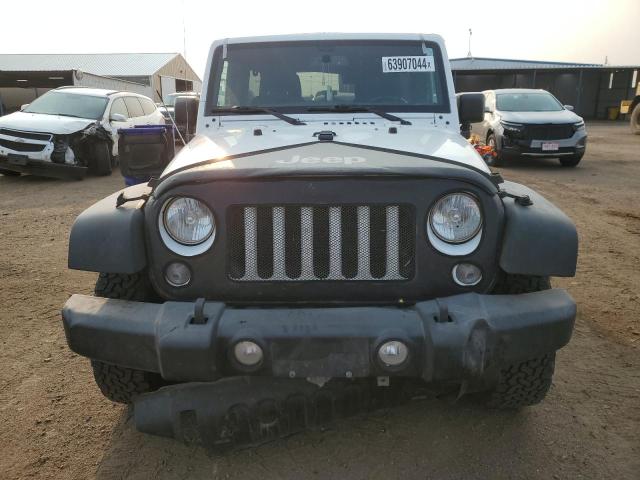 Photo 5 from auction – 2016 JEEP WRANGLER U with VIN 1C4BJWDG9GL257974
