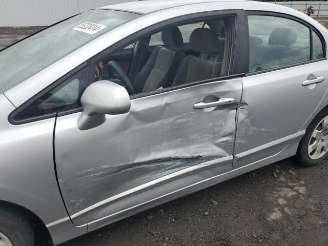 Photo 7 from auction – 2011 HONDA CIVIC LX with VIN 19XFA1F5XBE043495
