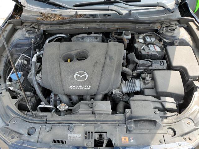 Photo 11 from auction – 2015 MAZDA 3 SV with VIN JM1BM1T74F1262313