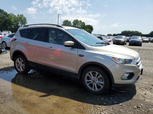Photo 4 from auction – 2018 FORD ESCAPE SE with VIN 1FMCU9GD0JUD24960