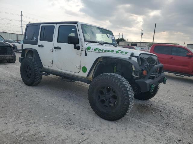 Photo 4 from auction – 2011 JEEP WRANGLER U with VIN 1J4BA3H15BL629284
