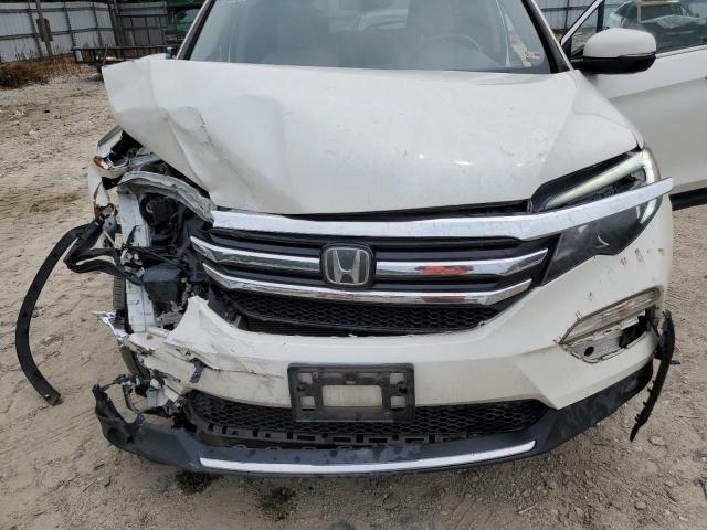 Photo 11 from auction – 2017 HONDA PILOT TOUR with VIN 5FNYF5H92HB029255