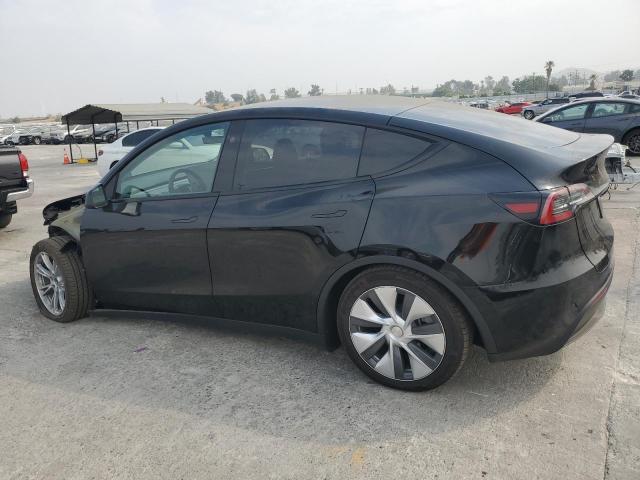 Снимка 2 от търг – 2023 TESLA MODEL Y с VIN 7SAYGAEE5PF894603