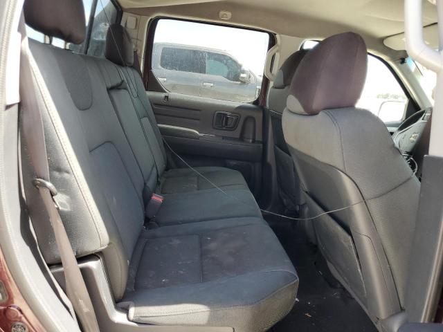 Photo 10 from auction – 2010 HONDA RIDGELINE with VIN 5FPYK1F42AB009497