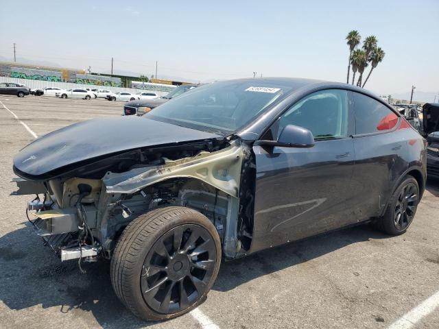 TESLA MODEL Y 2024 with VIN 7SAYGDED7RF054334 - Photo from auction