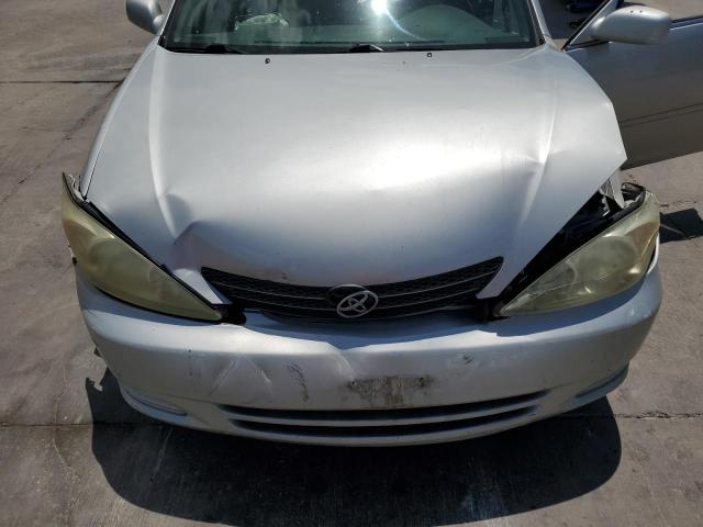 Photo 11 from auction – 2004 TOYOTA CAMRY LE with VIN 4T1BE32K54U817713